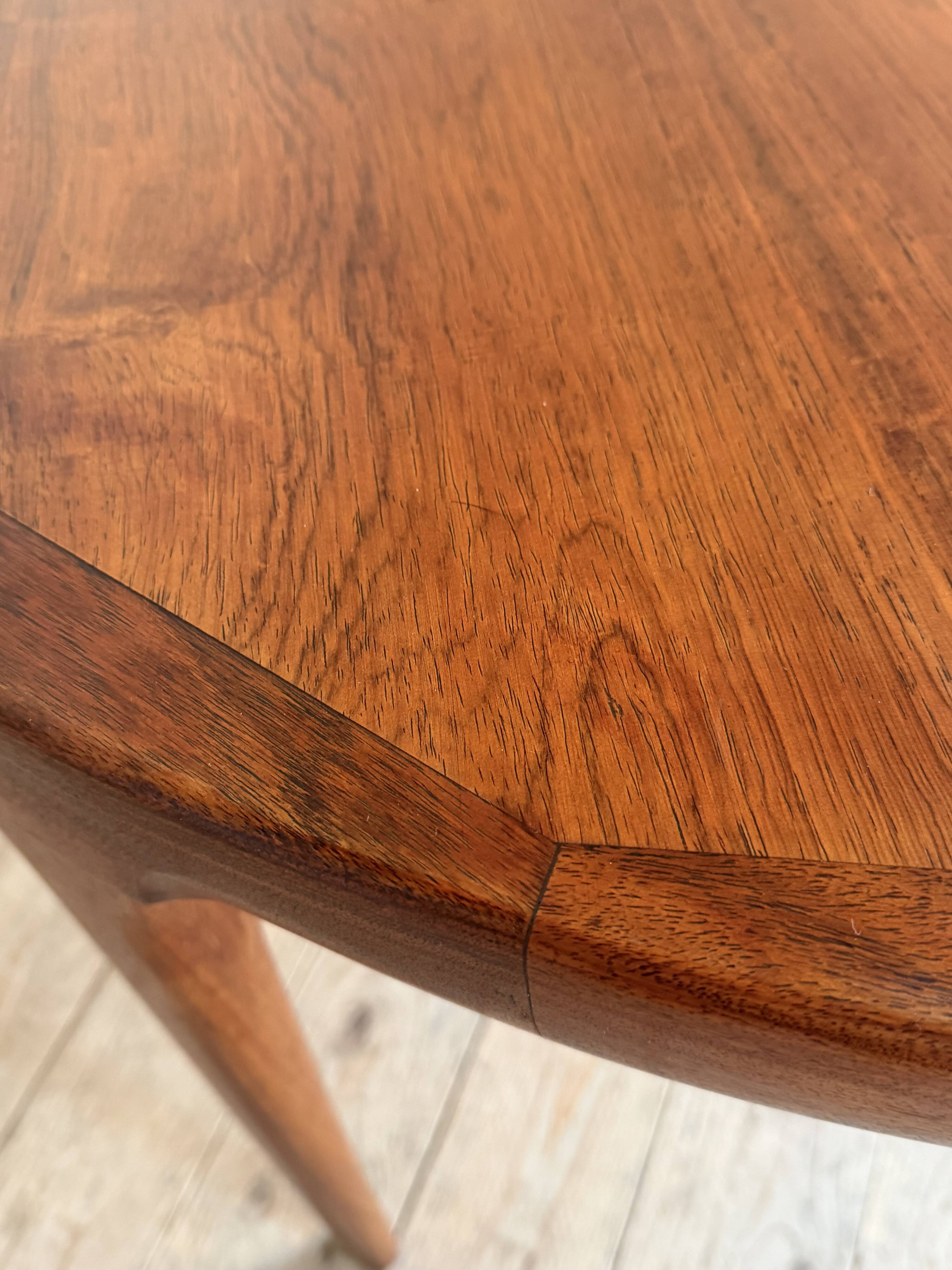 Scandinavian round table in rosewood by Ib Kofod Larsen