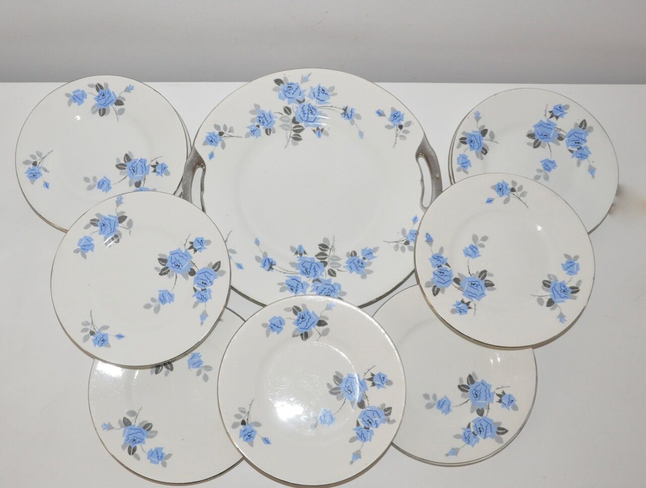 Set of 11 plates dessert and 1 dish of the pottery of onnaing