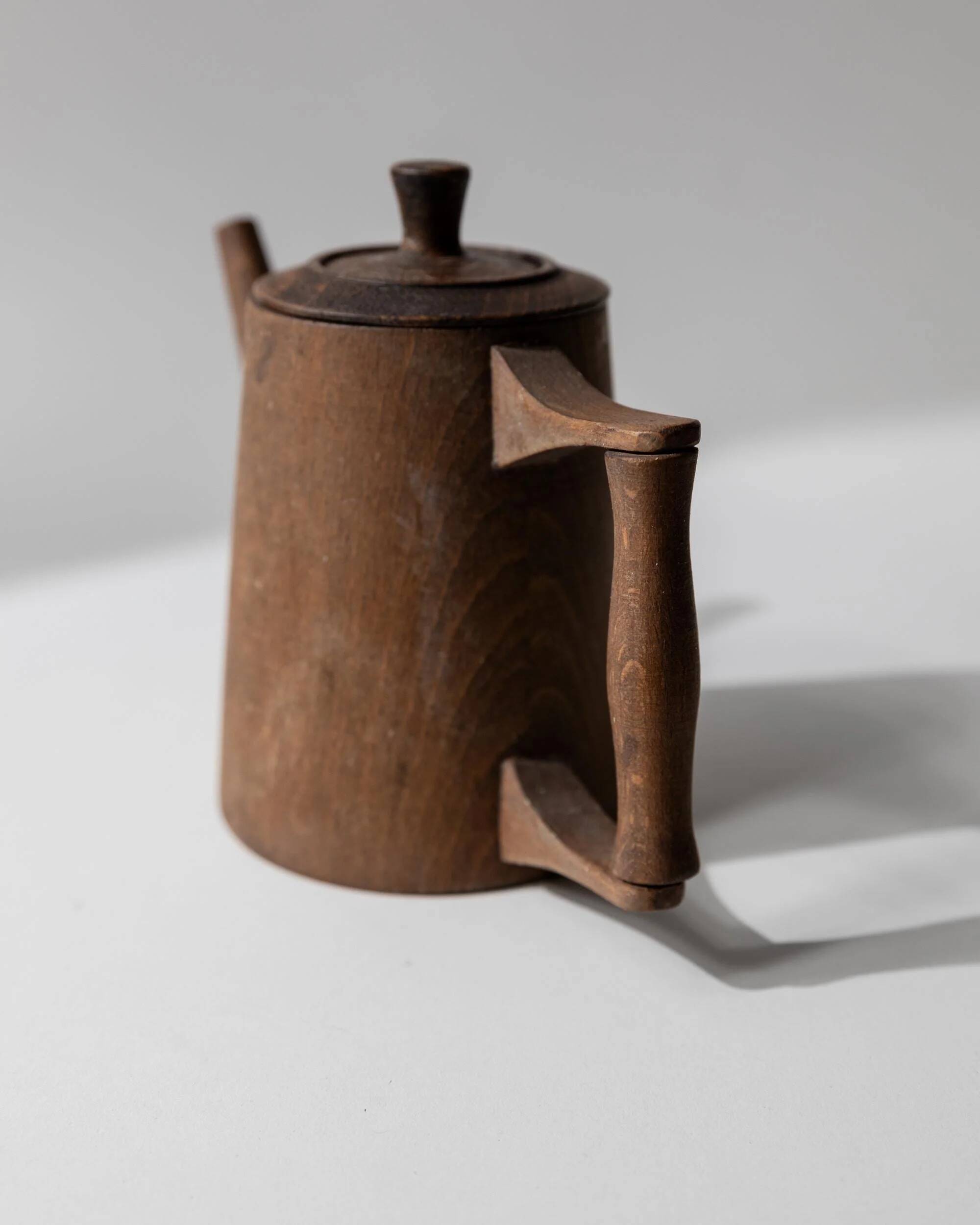 Vintage wooden pitcher from the 1960s, hand-carved.