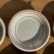 Set of 9 small Italian dessert plates Primula with red and green trim.