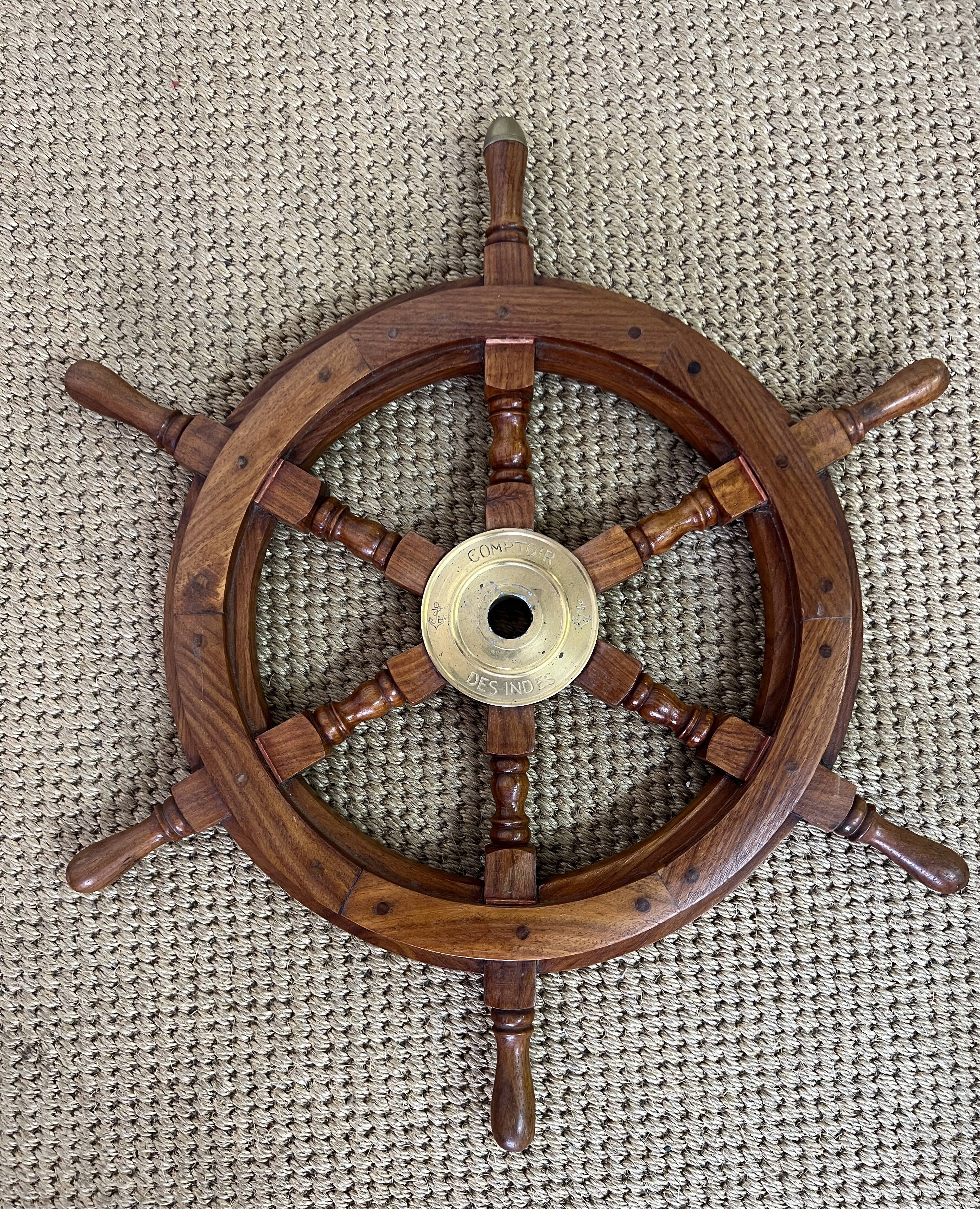 Rudder bar wheel boat in wood and brass "Comptoir des Indes" shelf
