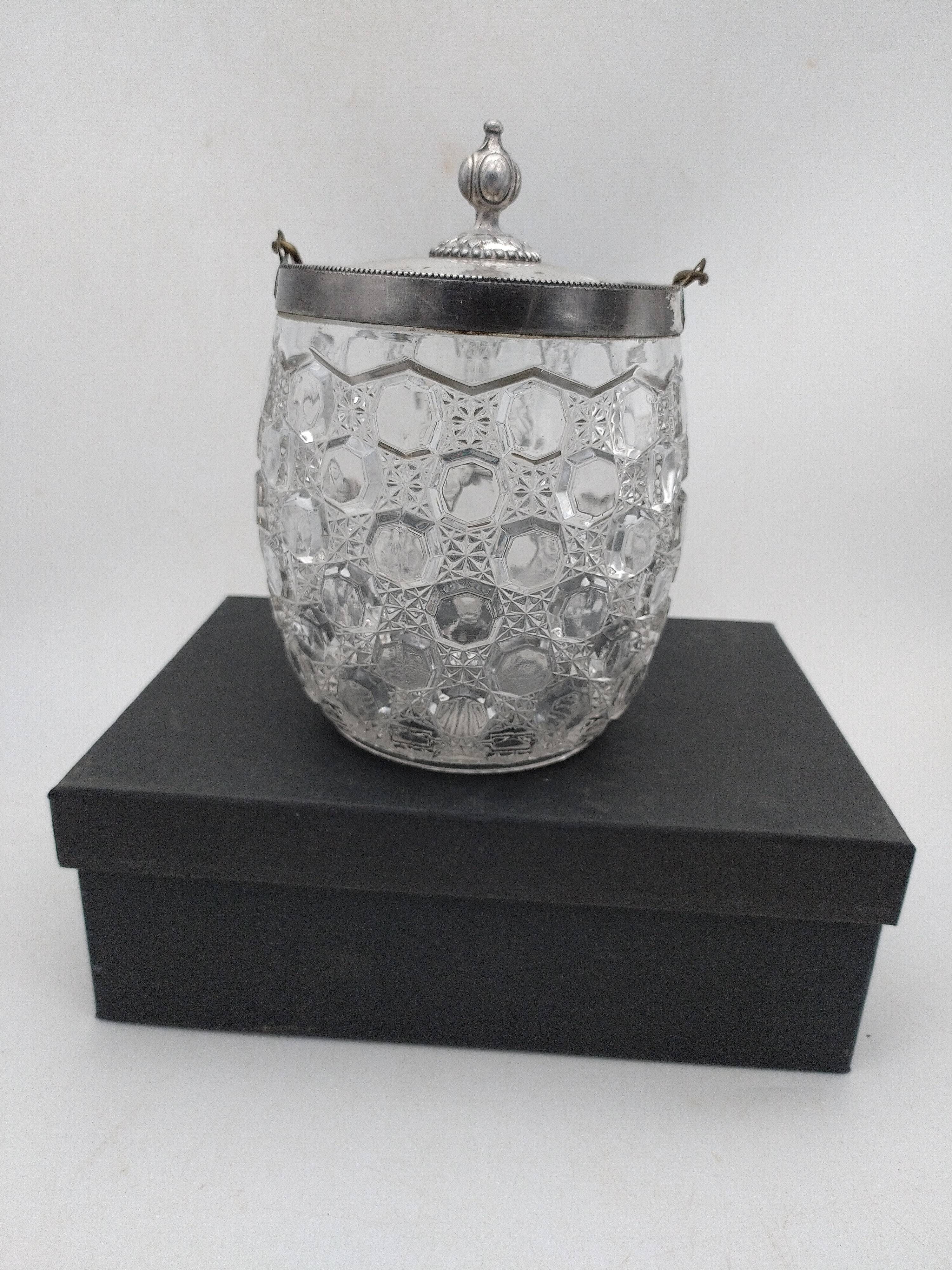 Biscuit, ice cube or candy pot, made of crystal and metal.