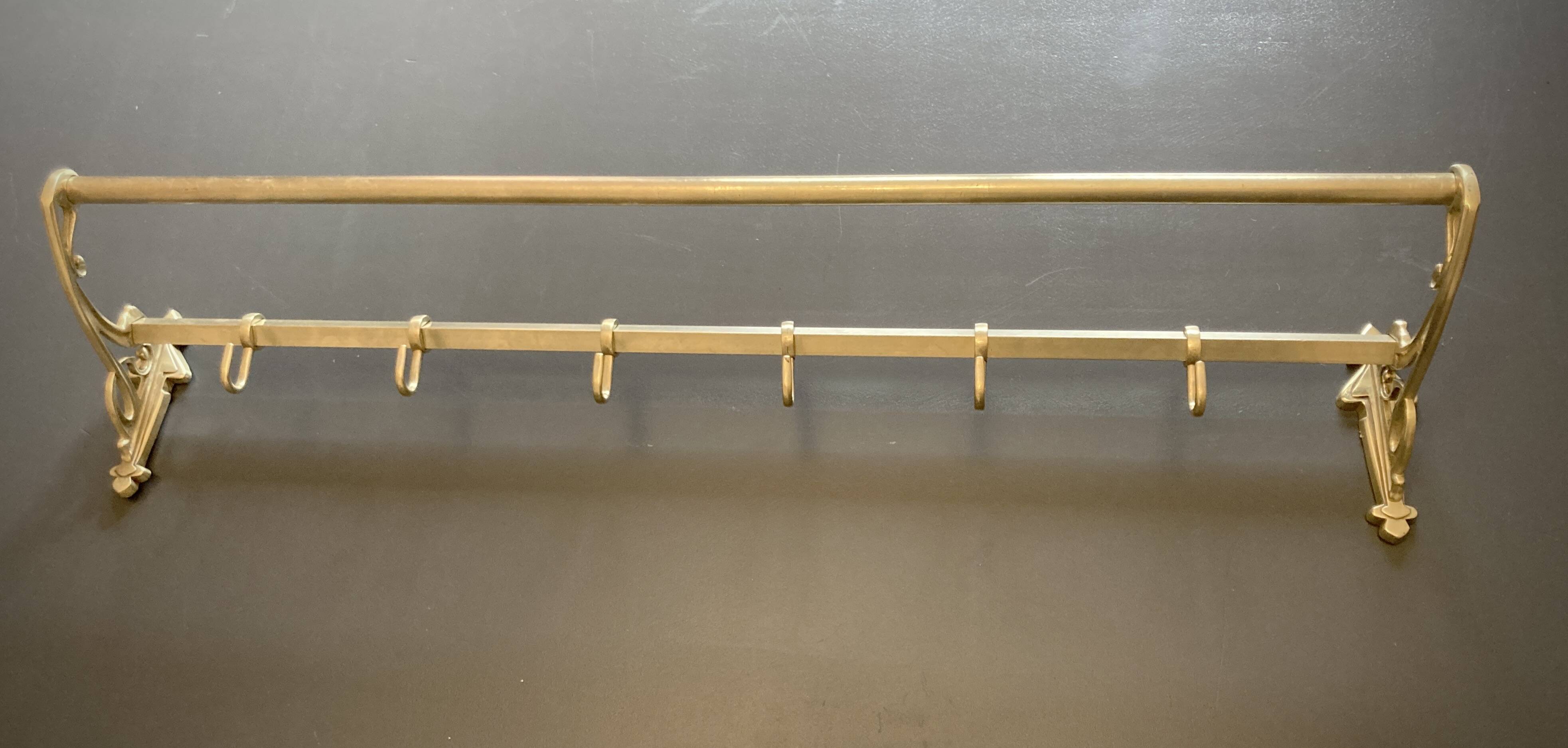 Art-deco wall-mounted coat rack in brass