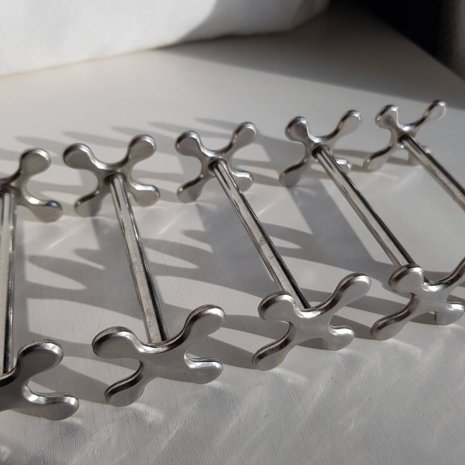 Coffret de 6 porte-couteaux en inox Chabanne dans sa boîte d'origine.