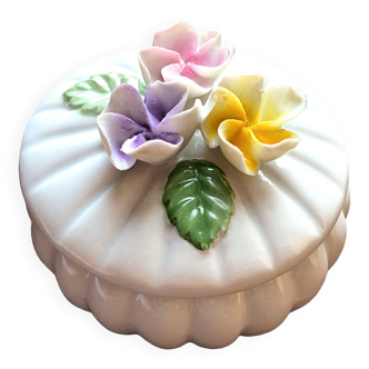 Porcelain candy box decorated with floral slips