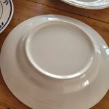 4 ironstone plates with blue pattern.