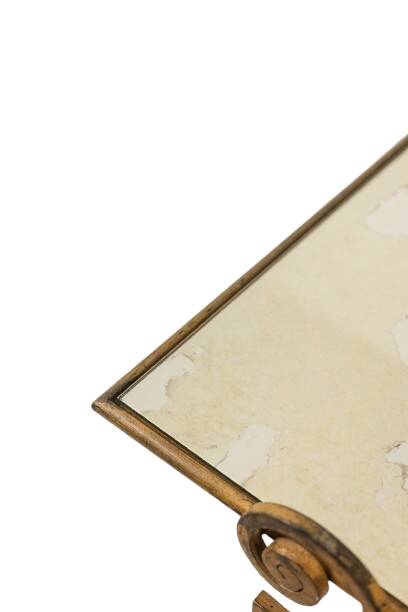 Gold wrought iron coffee table with a mirrored glass top. 1970s.