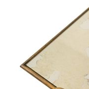 Table basse en fer forgé doré et plateau de verre églomisé. Années 1970