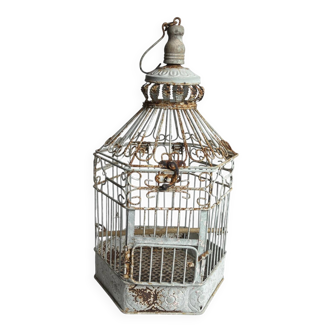 Vintage hexagonal metal birdcage from around 1940.