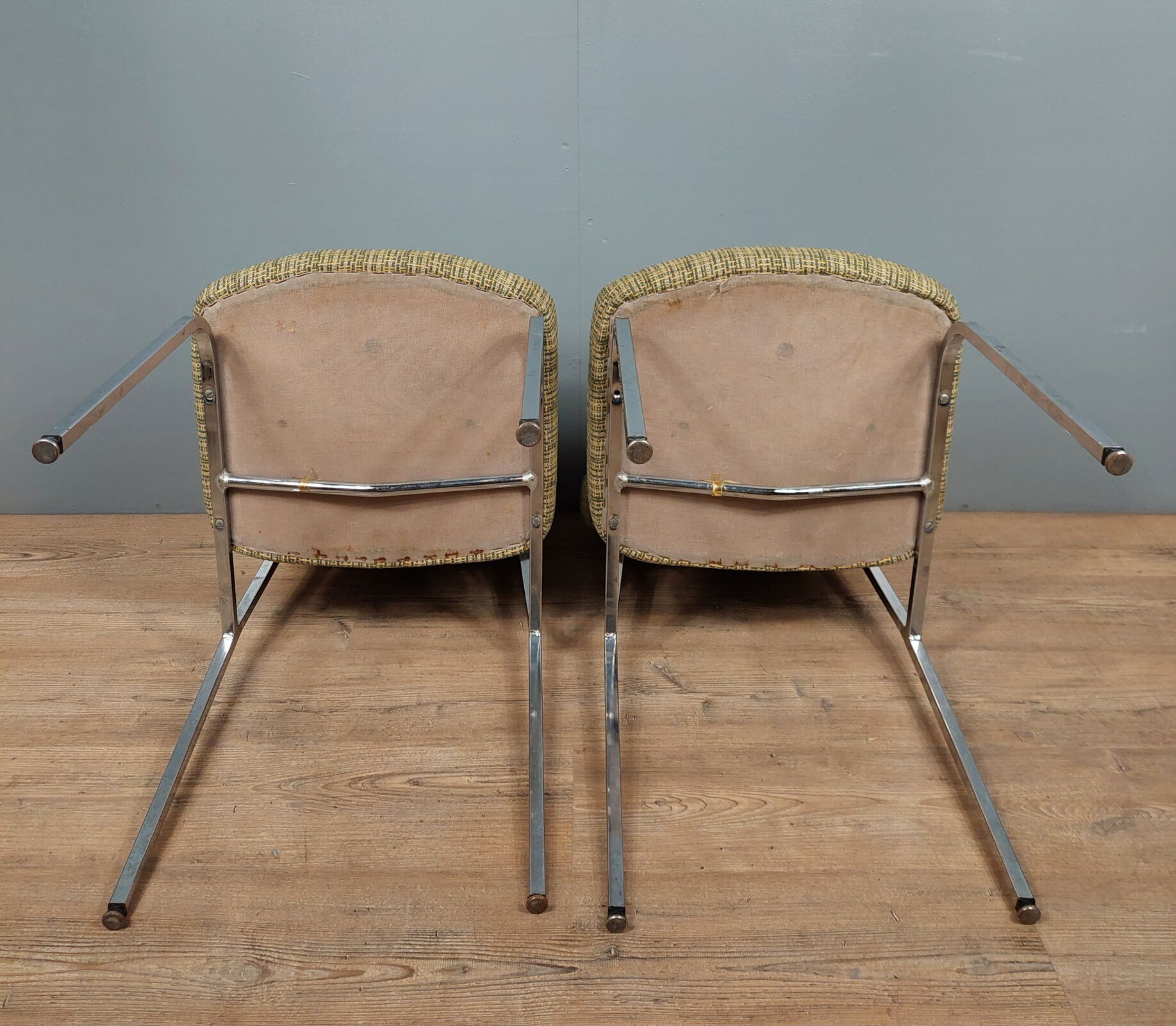 Pair of vintage chairs in fabrics and metal