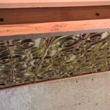 Old wrought iron railing with mirror and teak frame