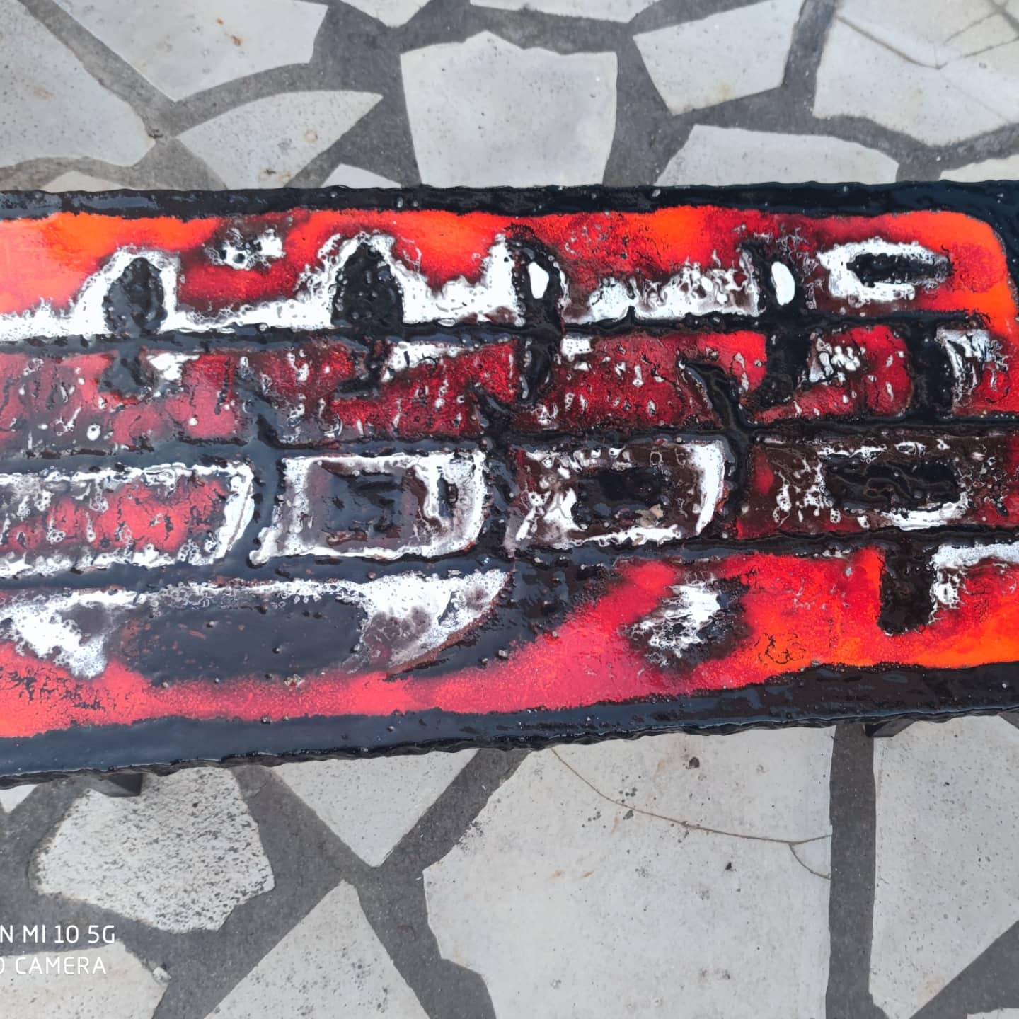Ceramic coffee table on a lava stone slab, circa 1950