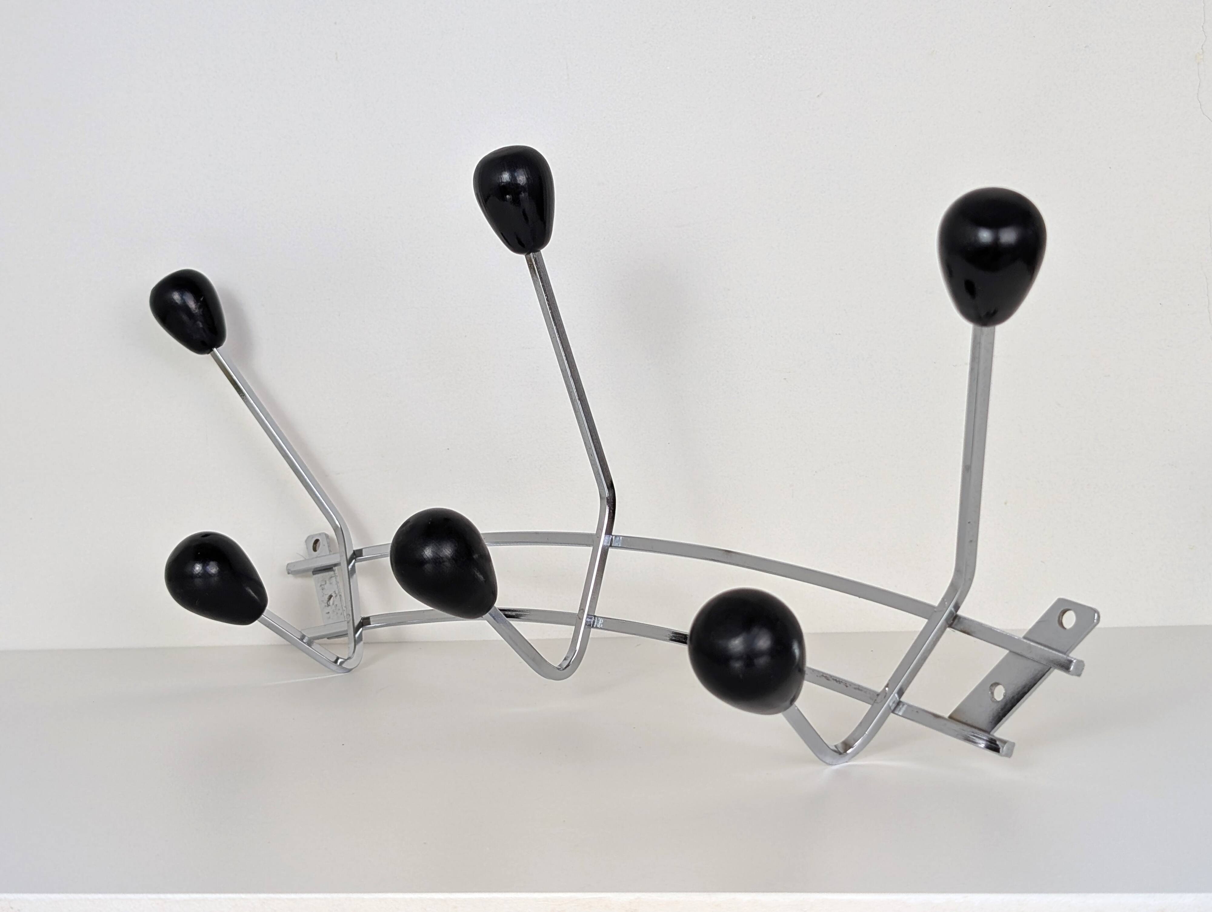 Chrome wall-mounted coat rack