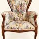 Louis XV style armchair with floral jacquard upholstery.