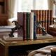 Art Deco bookends with patinated ibex in a taupe marble base.