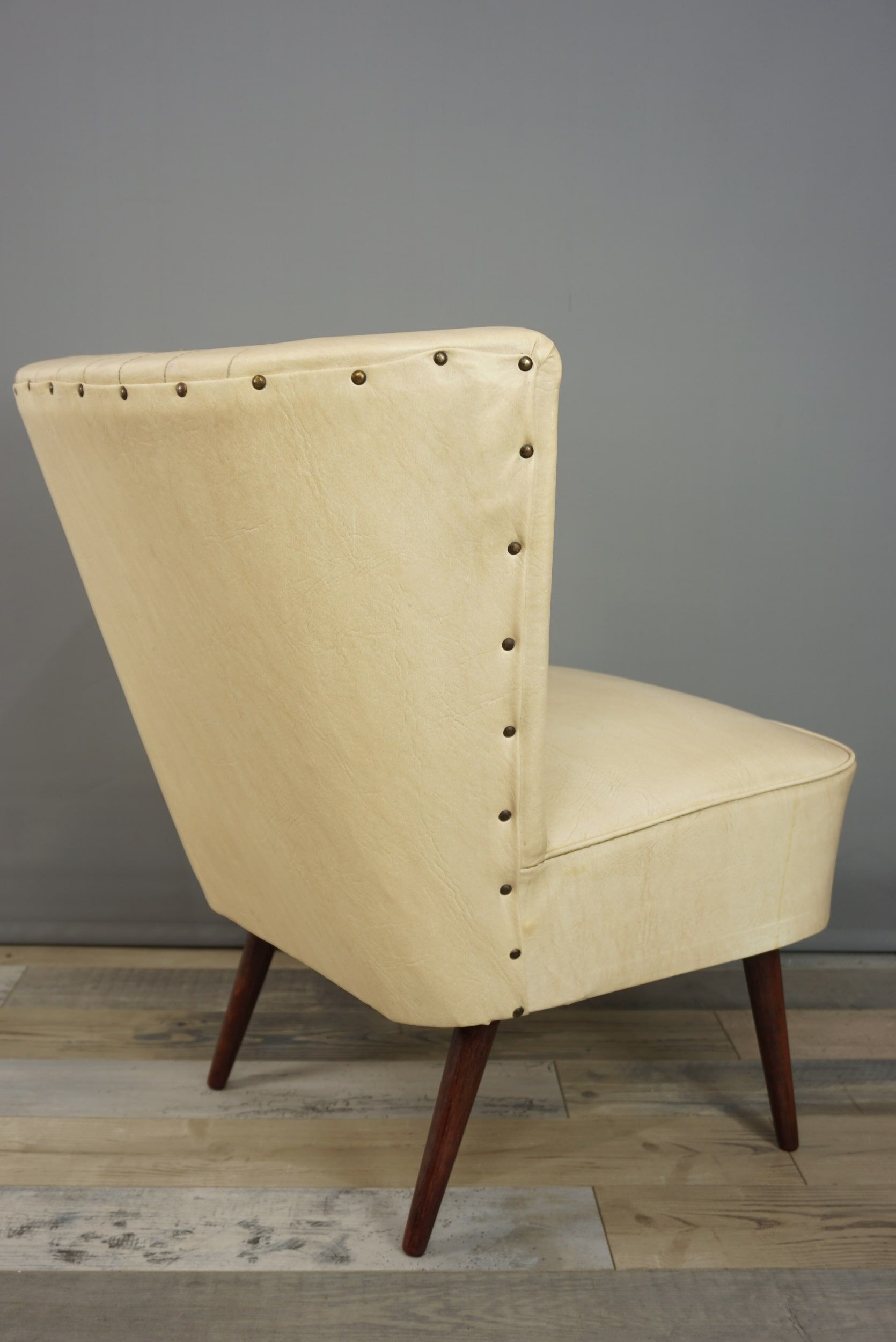 Cocktail armchair 50s in wood and imitation leather