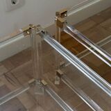 2 side tables in plexiglass, glass, and brass.