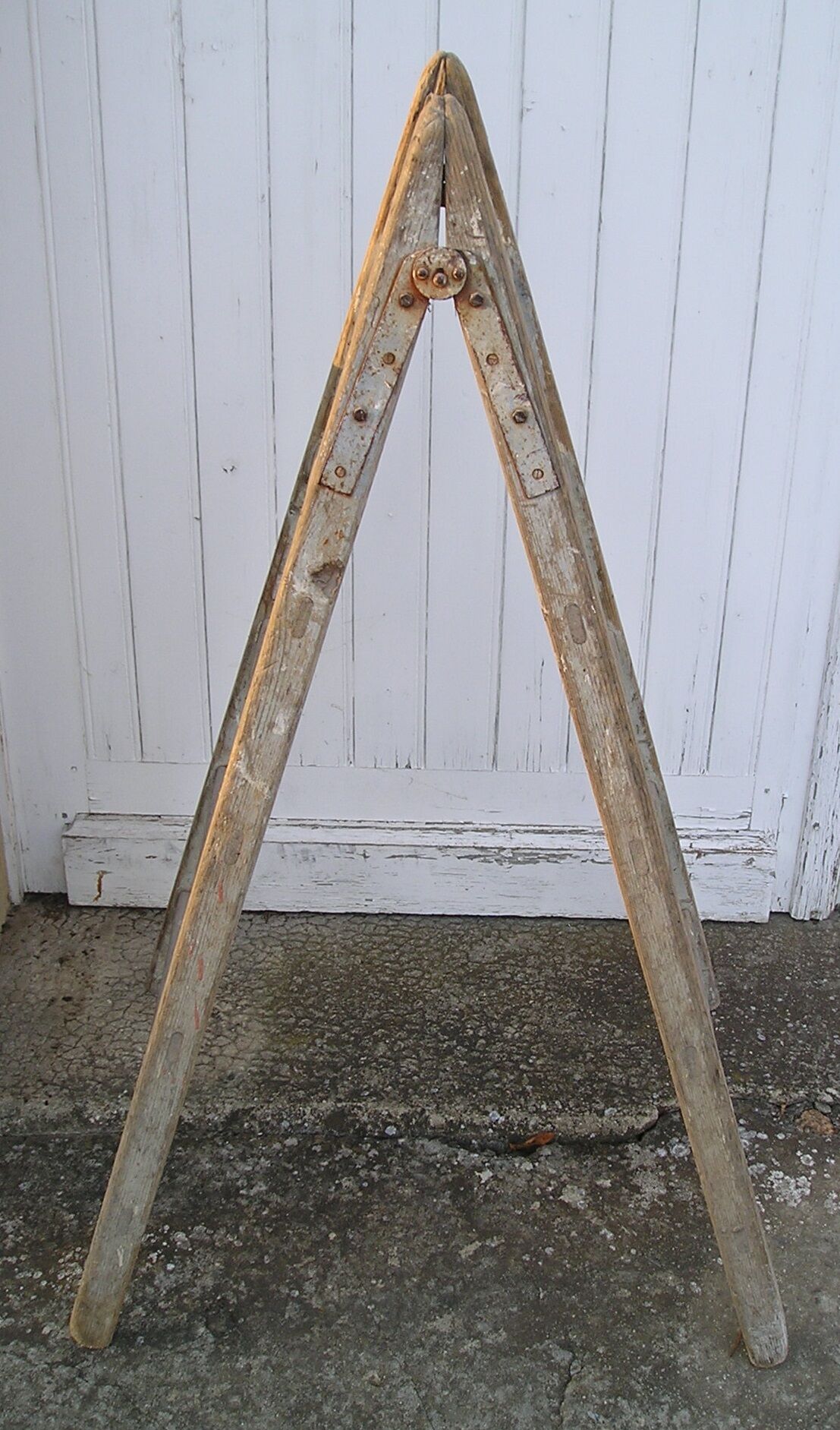 Old wooden painter ladder