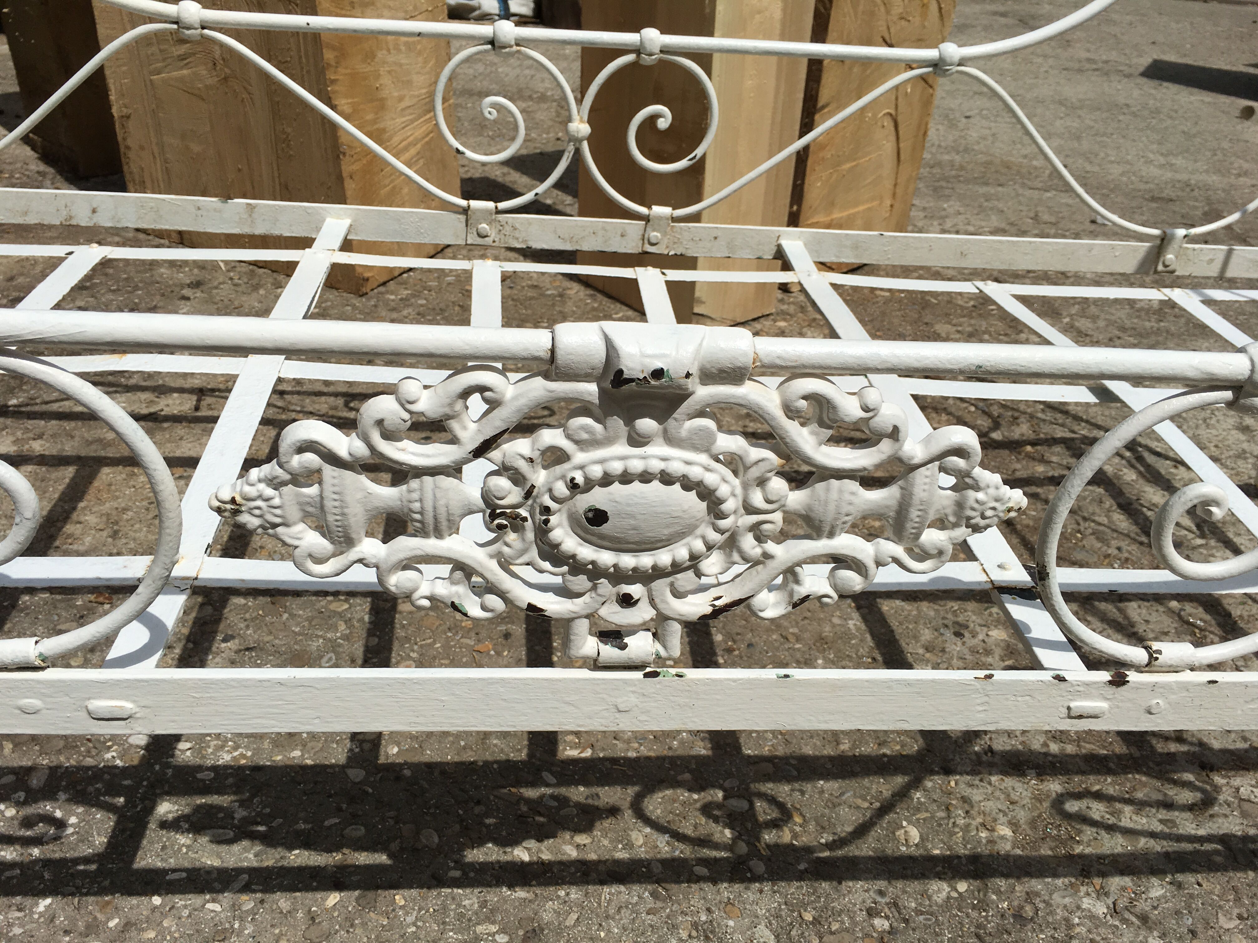 Ancient white metal bed