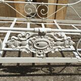 Ancient white metal bed