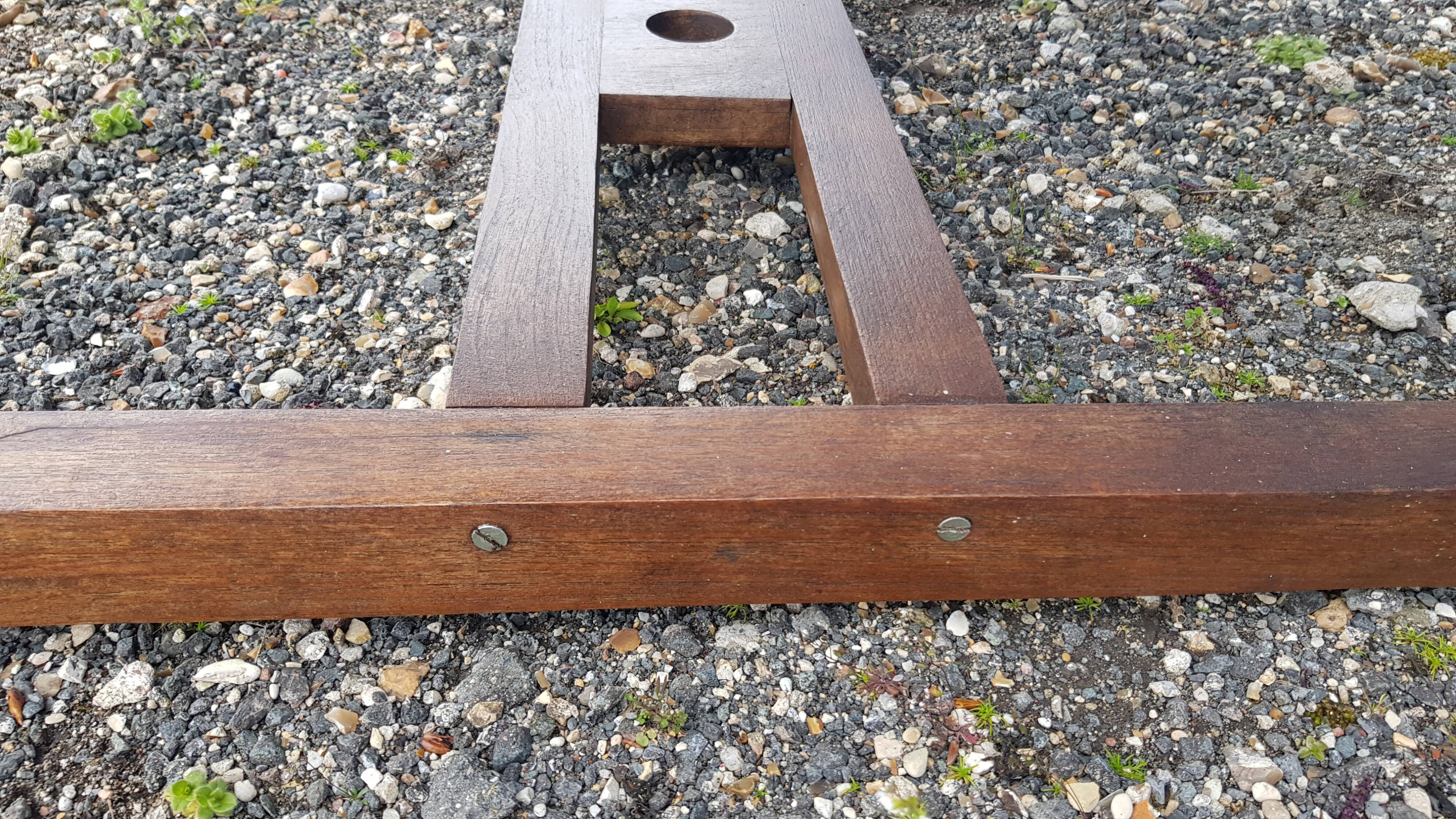 Stretchable garden dining table in solid teak