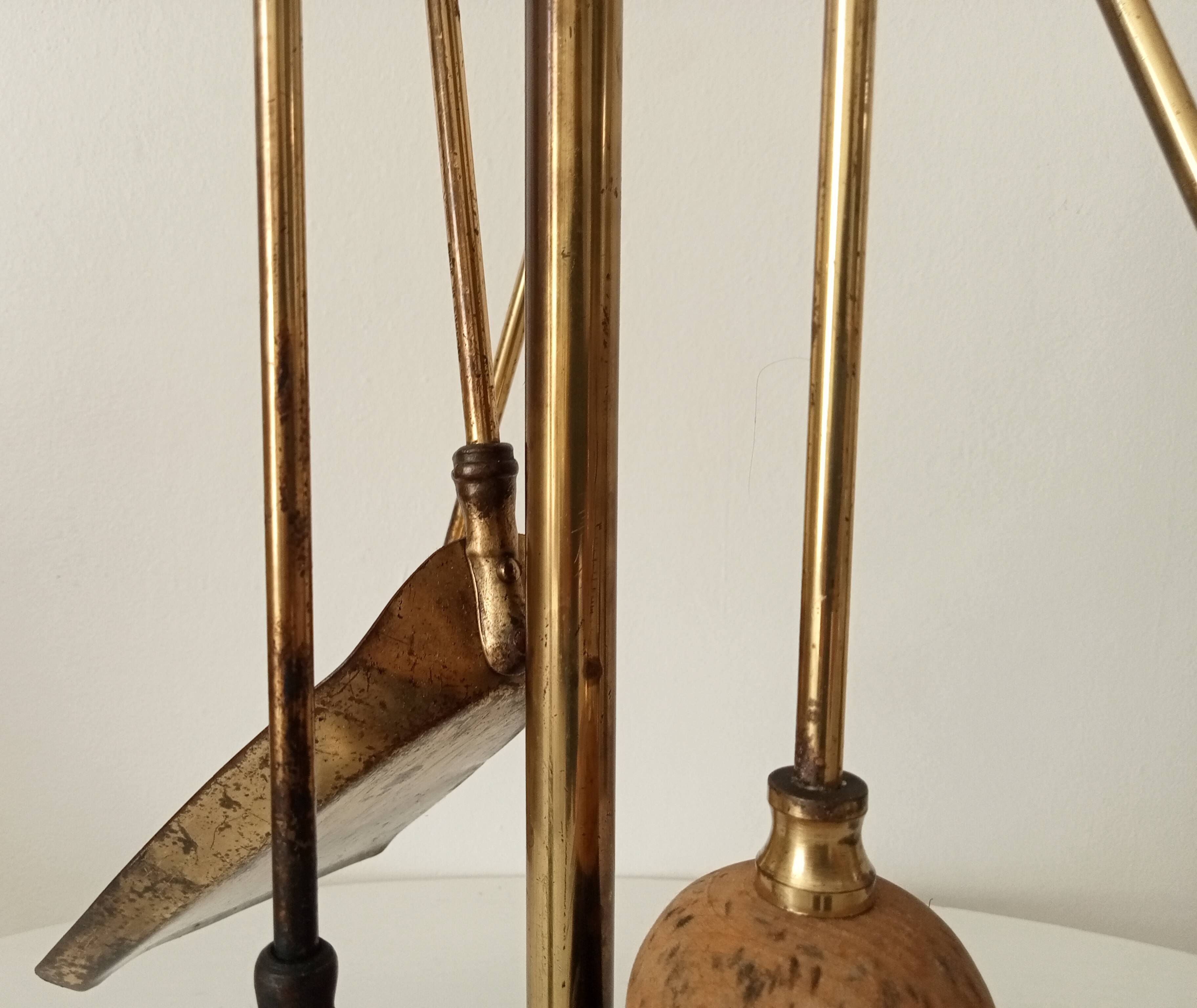 Old brass fireplace servant