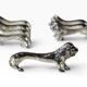 Series of antique knife rests in the shape of a lion, silver-plated metal.