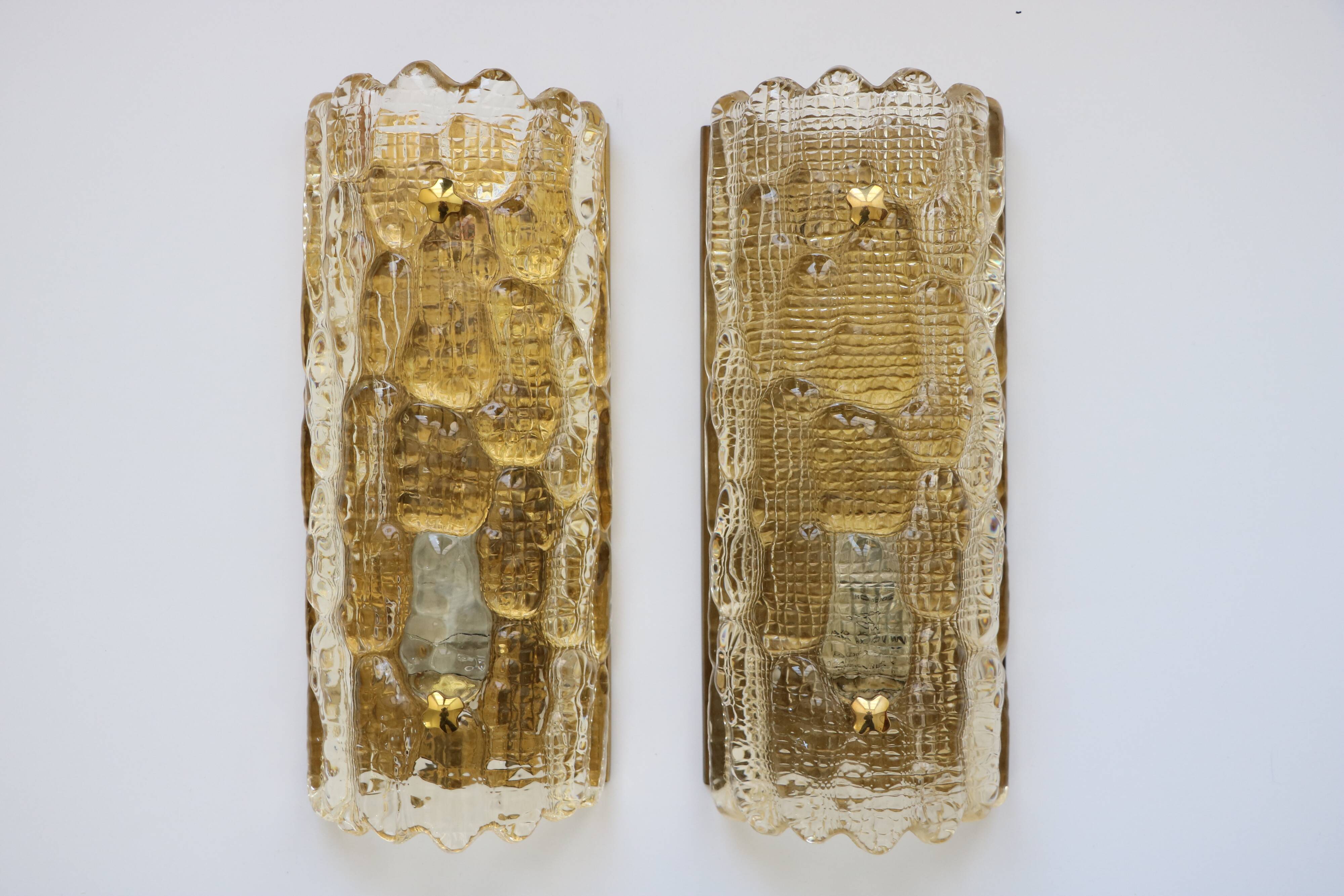 Pair of glass and brass wall lights by Carl Fagerlund for Orrefors, 1960.