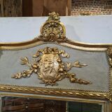 Mirror patinated golden and gray trumeau