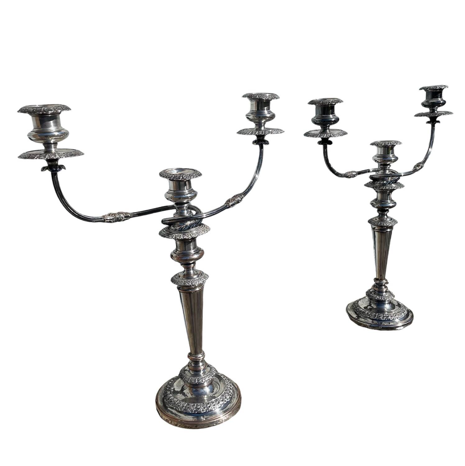 Pair of convertible three-light candelabra in silver-plated metal.