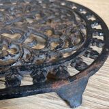 Dessous de plat en fonte