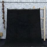 Simple black handmade wool rug 250cm x 150cm