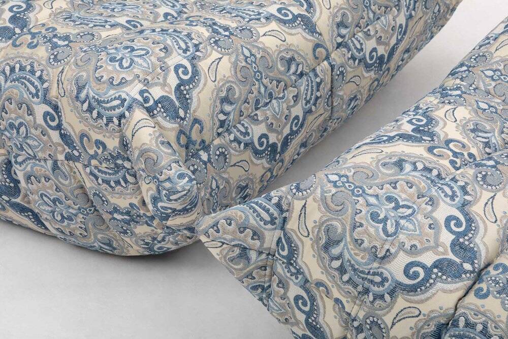 Togo lounge chair and pouf in patterned fabric by Michel Ducaroy for Ligne Roset, 1973, set of 2