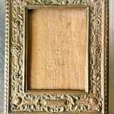 Antique brass metal picture frame in baroque style