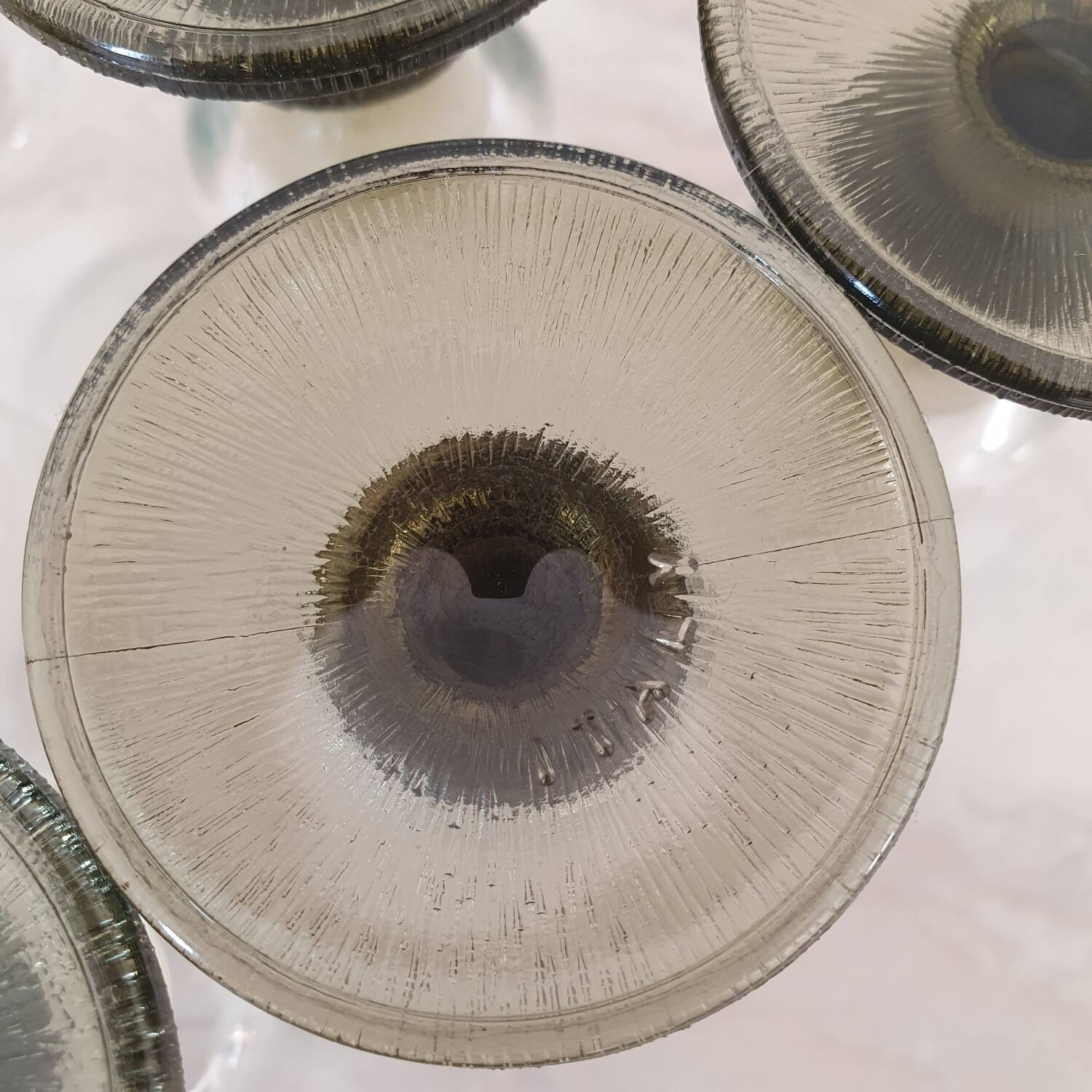 6 small green foot flutes in the Timo Sarpaneva style