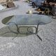 Silver metal table with smoked glass top from the 1970s.