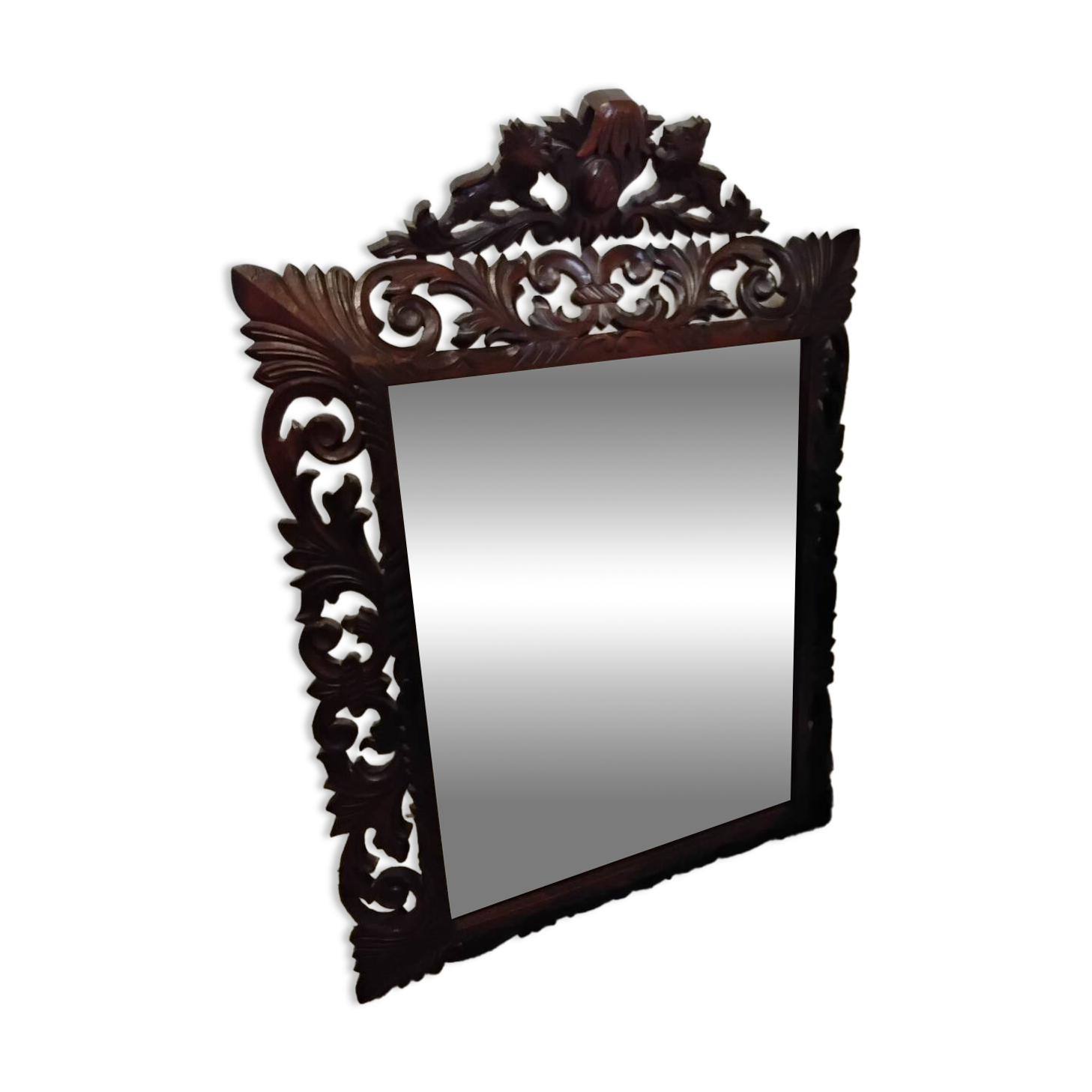 Antique carved wooden mirror