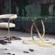 Brass ribbon console table Design Institute of America