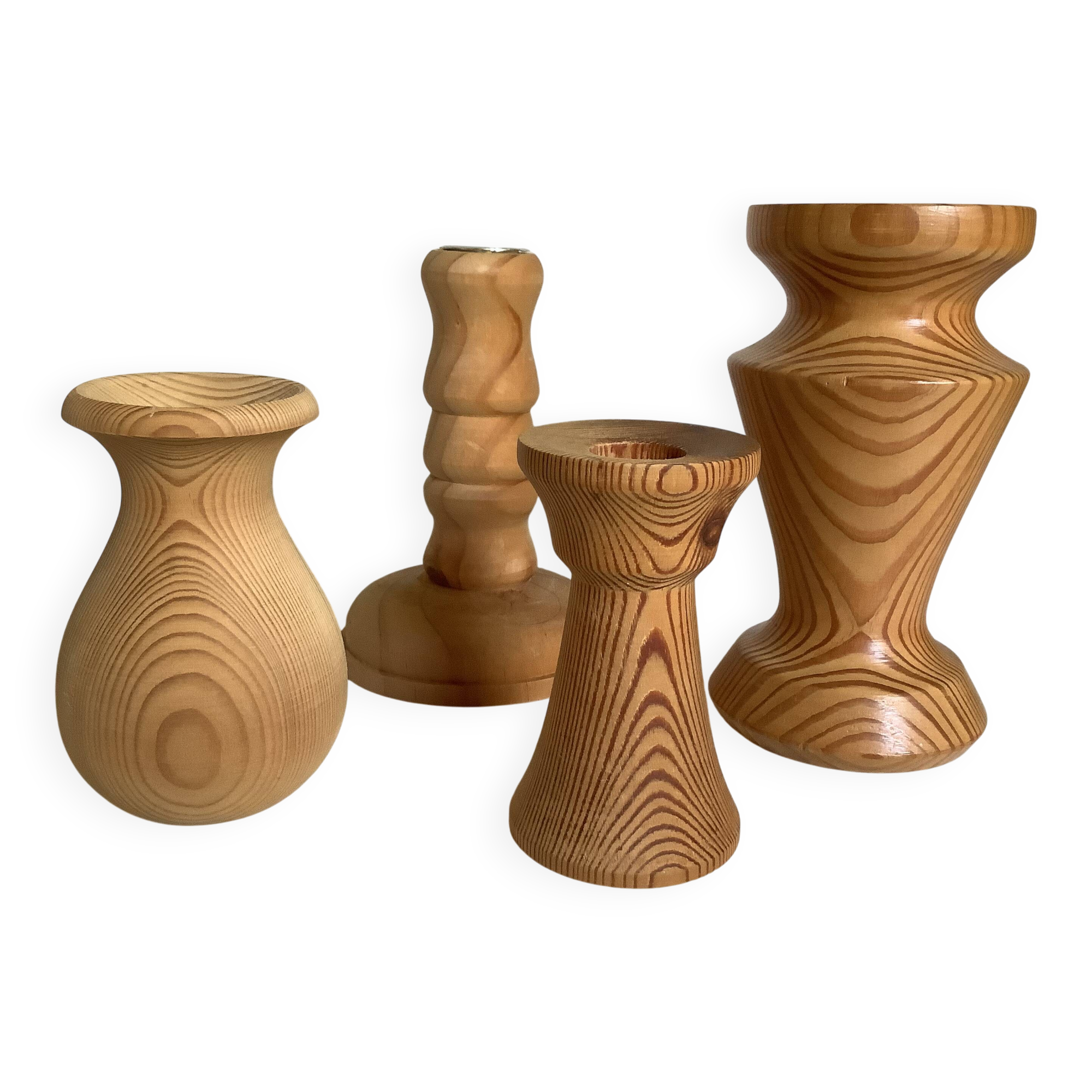Four wooden vases and candlesticks