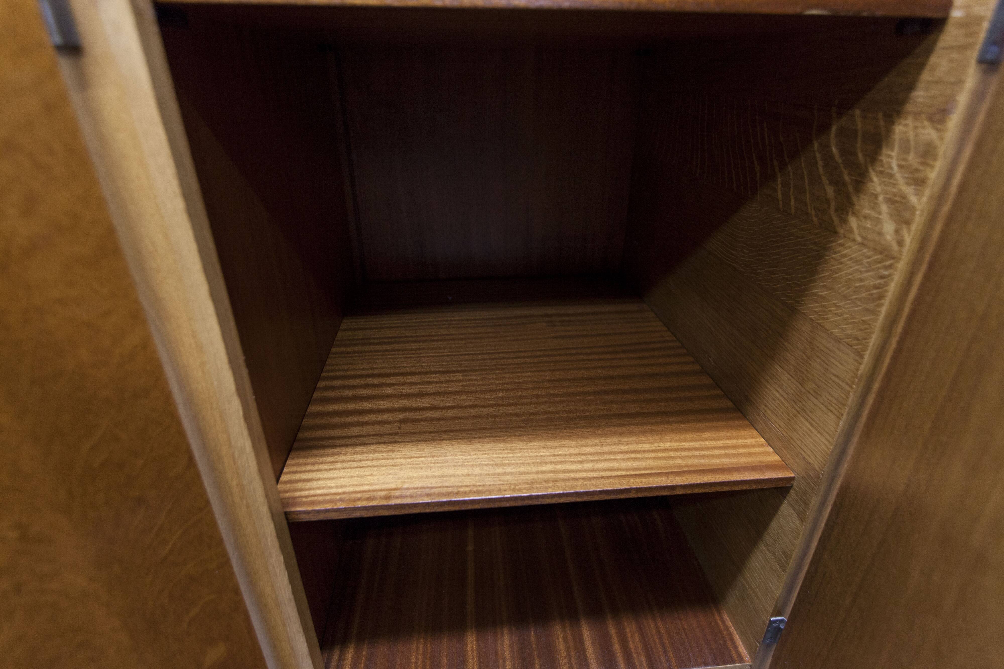 French wardrobe with tapered legs, 3 doors, 1 mirror (27*130), and 1 drawer.