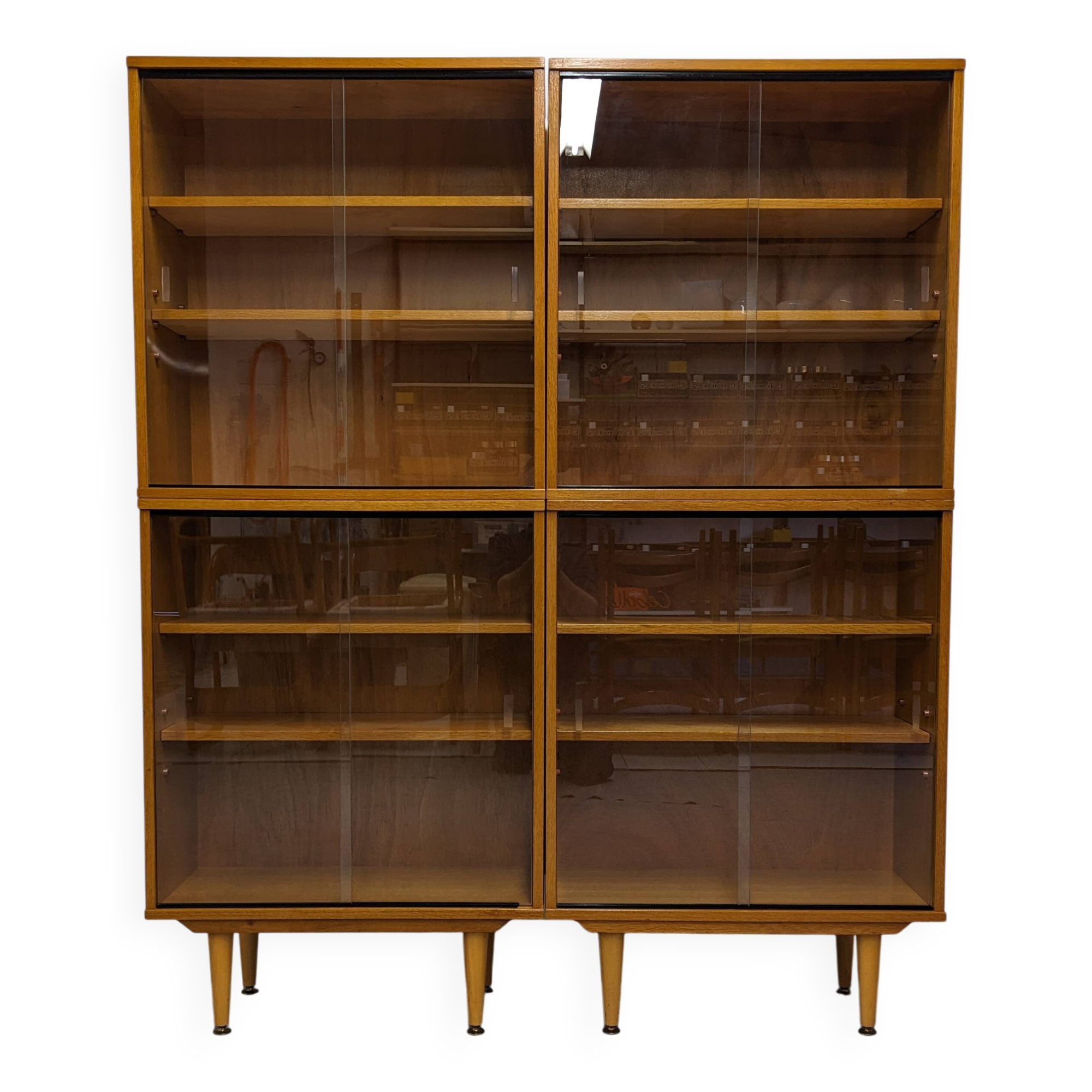 Library or display cabinet with 4 modules in light oak, France around 1960.