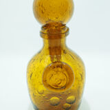 Yellow glass carafe with bubble details