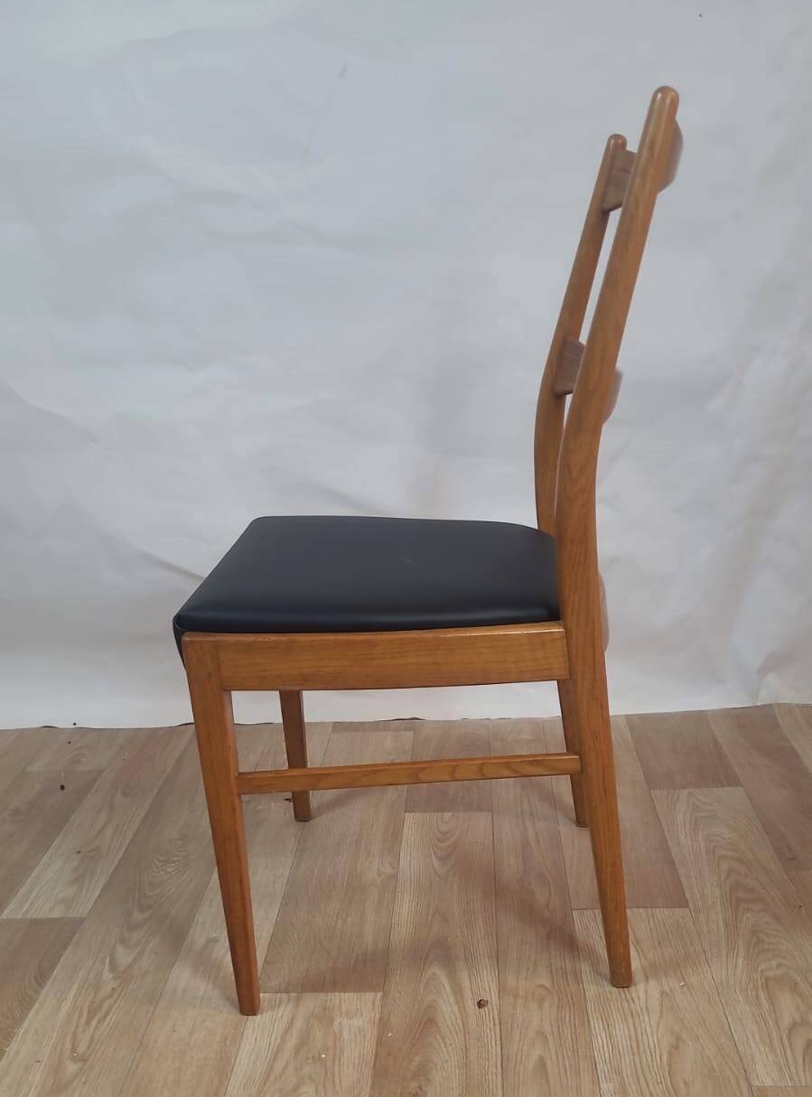 Vintage Danish teak chair – black faux leather seat (1960s)