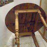 ﻿Round shutter table in solid walnut