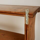 Vintage pine wall shelf with a scalloped front.