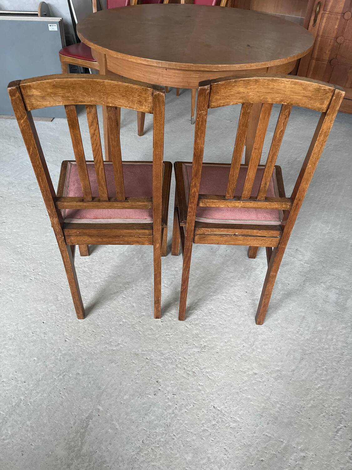 Pair of carved wooden chairs with pink velvet seat ART DECO