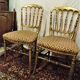 Paire de chaises en bois doré NIII