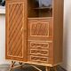 Rattan wardrobe with tapered legs from the 1960s.