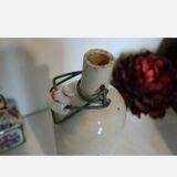 Sandstone bottle and porcelain cap