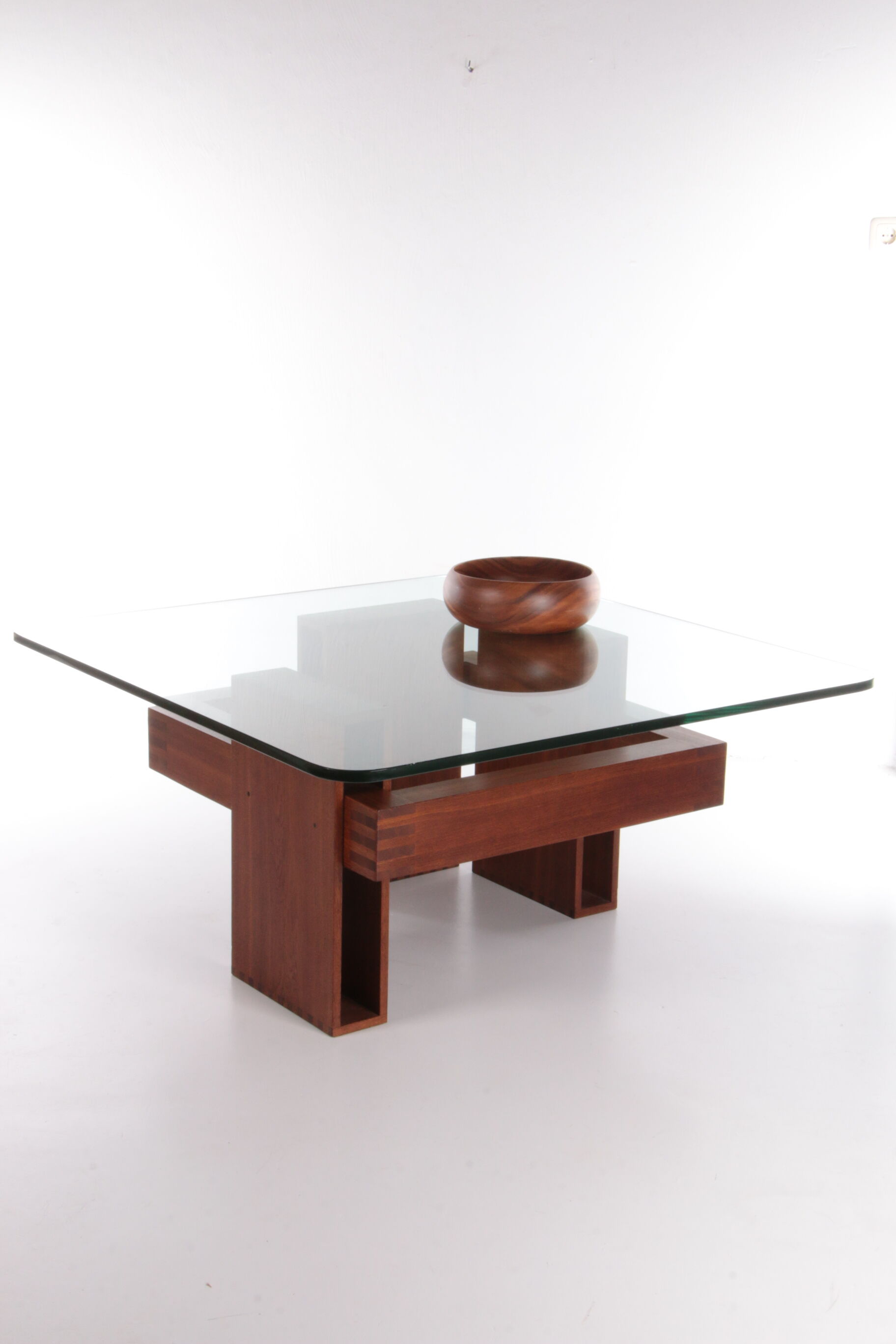 French Brutalist Design coffee table of teak with glass top, 1970